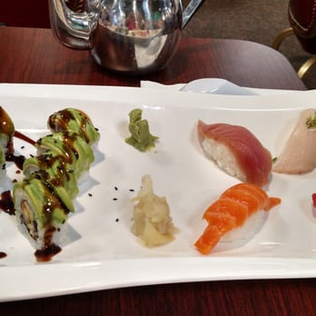 CoCo Mongolian Grill & Sushi - This is a sushi lunch platter. You get 4 nigiri and one full roll (your choice) $16.99,  very fresh with a nice presentation. - Bars Near Me - Redding, California