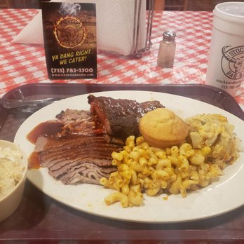 Stockyard Bar BQ - Brisket, wet ribs & pulled pork. Sides: heart attack potatoes & mac n cheese. Dessert: Banana pudding. - Barbeque Near Me - Houston, Texas Stockyard Bar BQ - Brisket, wet ribs & pulled pork. Sides: heart attack potatoes & mac n cheese. Dessert: Banana pudding. - Barbeque Near Me - Houston, Texas