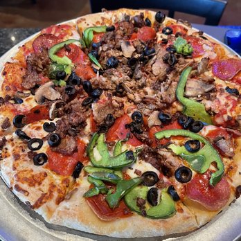 Jonathan's Grille - The Works pizza - Sports Bars Near Me - Spring Hill, Tennessee
