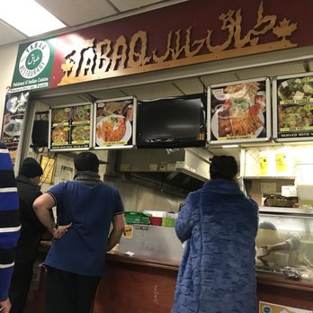 Tabaq Restaurant - customers at the counter - Pakistani Near Me - Mississauga, Ontario Tabaq Restaurant - customers at the counter - Pakistani Near Me - Mississauga, Ontario