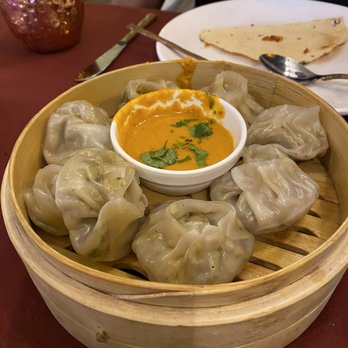 Empyrean Kitchen - Veggie momos (sorry we spilled the sauce lol) - Indian Near Me - Hoboken, New Jersey