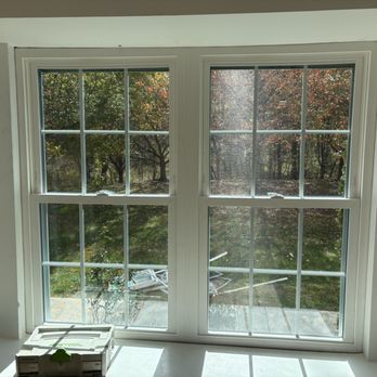 Precision Design - 2-windows installed in living room - General Contractors Near Me