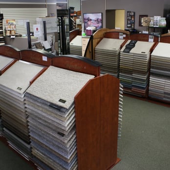 Lawrence Interiors - a variety of carpet samples in a store - Carpeting Near Me - Hastings, Minnesota Lawrence Interiors - a variety of carpet samples in a store - Carpeting Near Me - Hastings, Minnesota
