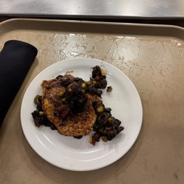 a plate of food on a tray a plate of food on a tray