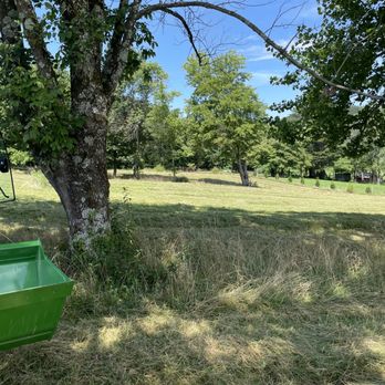 The Little Red Acres - a green bin in the middle of a field - Landscaping Near Me - Rickman, Tennessee The Little Red Acres - a green bin in the middle of a field - Landscaping Near Me - Rickman, Tennessee