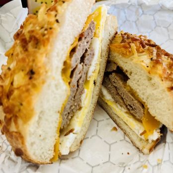 Einstein Bros. Bagels - Turkey sausage egg and cheese on cheesy hashbrown bagel - Bagels Near Me - Altamonte Springs, Florida
