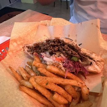 Twisted Meats - Döner Sandwich with garlic yogurt sauce and fries. - Mediterranean Near Me - Thousand Oaks, California Twisted Meats - Döner Sandwich with garlic yogurt sauce and fries. - Mediterranean Near Me - Thousand Oaks, California