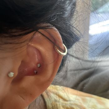 Laughing Buddha Seattle - Double conch piercing (tragus and helix were done elsewhere) - Tattoo Near Me - Seattle, Washington