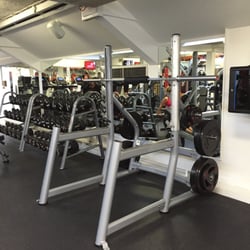 The Fitness Mosaic - Free weights on gym floor