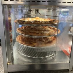 Bucks Pizzeria - The pizza while you wait is so tempting to just grab and eat, it's got "pizza shop" vibes and smells so yummy!!!!