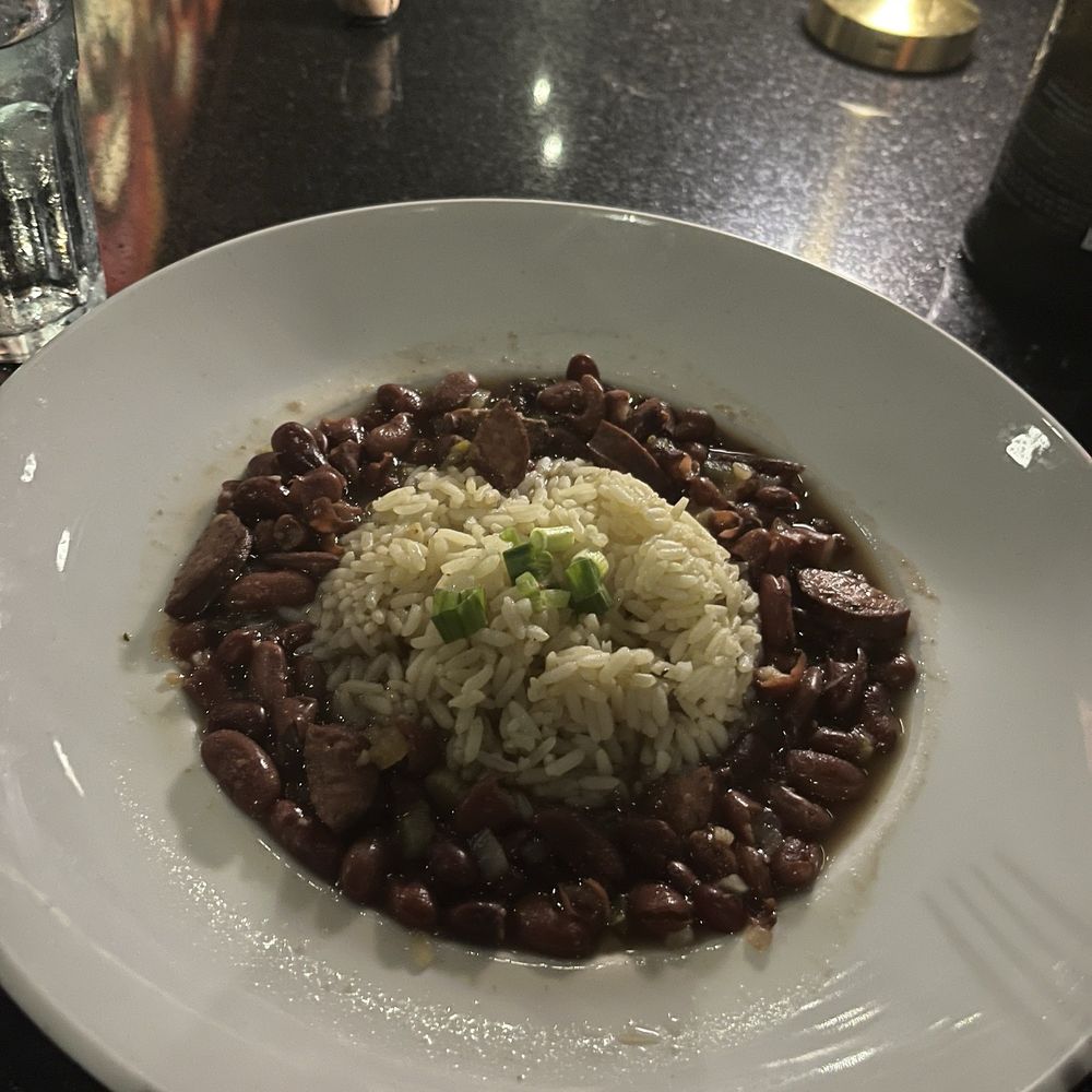 Kiss - Red beans, rice and sausage - New American Near Me - Houston, Texas Kiss - Red beans, rice and sausage - New American Near Me - Houston, Texas