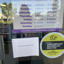 Salon Centric - On break sign.