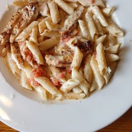 Penne pasta with chicken and fruccetta tomatoes. Penne pasta with chicken and fruccetta tomatoes.