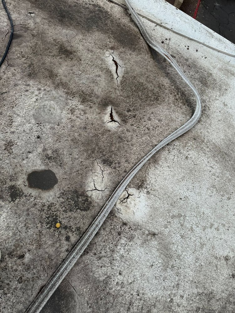 Slide of Avis Roofing Service