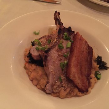 Chef's Table At the Edgewater - grilled pork chop with white bean cassoulet, candied collard greens and pork belly - New American Near Me - Winter Garden, Florida Chef's Table At the Edgewater - grilled pork chop with white bean cassoulet, candied collard greens and pork belly - New American Near Me - Winter Garden, Florida
