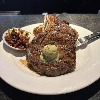 ChopHouse & Brewery - BONE-IN RIB EYE (GF) loaded BAKED POTATO (GF) - Steakhouses Near Me - Denver, Colorado