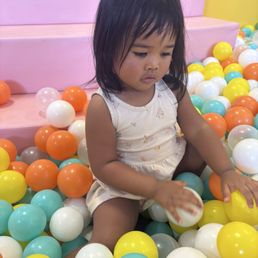 She loves the ball pit! She loves the ball pit!