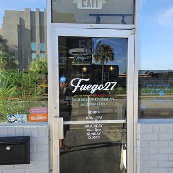 Fuego27 - front door with hours - Latin American Near Me - Winter Haven, Florida