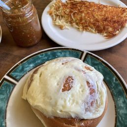 Sourdough cinnamon roll with a side of hashbrowns Sourdough cinnamon roll with a side of hashbrowns