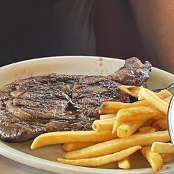Cody's Original Roadhouse - My husband had this huge ribeye steak with some fresh French fries crisp and flavorful