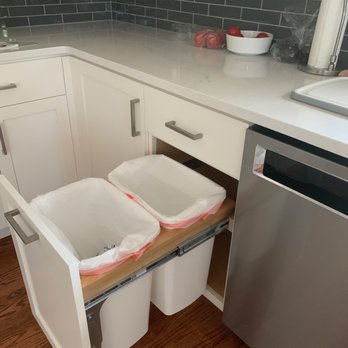 Artisan Home Construction - Pull out trash and recycle - General Contractors Near Me
