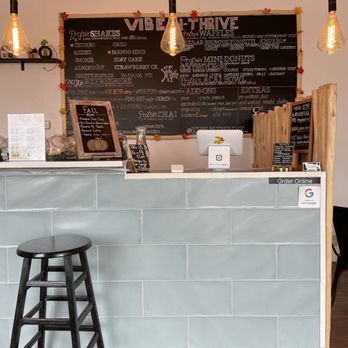 Vibe-N-Thrive - ows a bar with stools and a chalkboard - Waffles Near Me - El Paso, Texas
