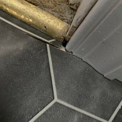 Trageser Home Repairs  - floor sliced and gaps in entrance