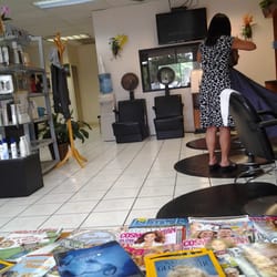 K & G Beauty Salon - My stylist, Kim hard at work!