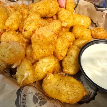 Dixie's Biergarten - Lightly breaded and seasoned cheese curds. Delicious. - Beer Bar Near Me - Decorah, Iowa Dixie's Biergarten - Lightly breaded and seasoned cheese curds. Delicious. - Beer Bar Near Me - Decorah, Iowa