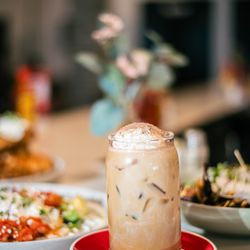 Roasted Nomad - Aussie Style Iced Coffee!
... a vanilla iced latte topped with ice cream and a sprinkle of Mexican chocolate!
