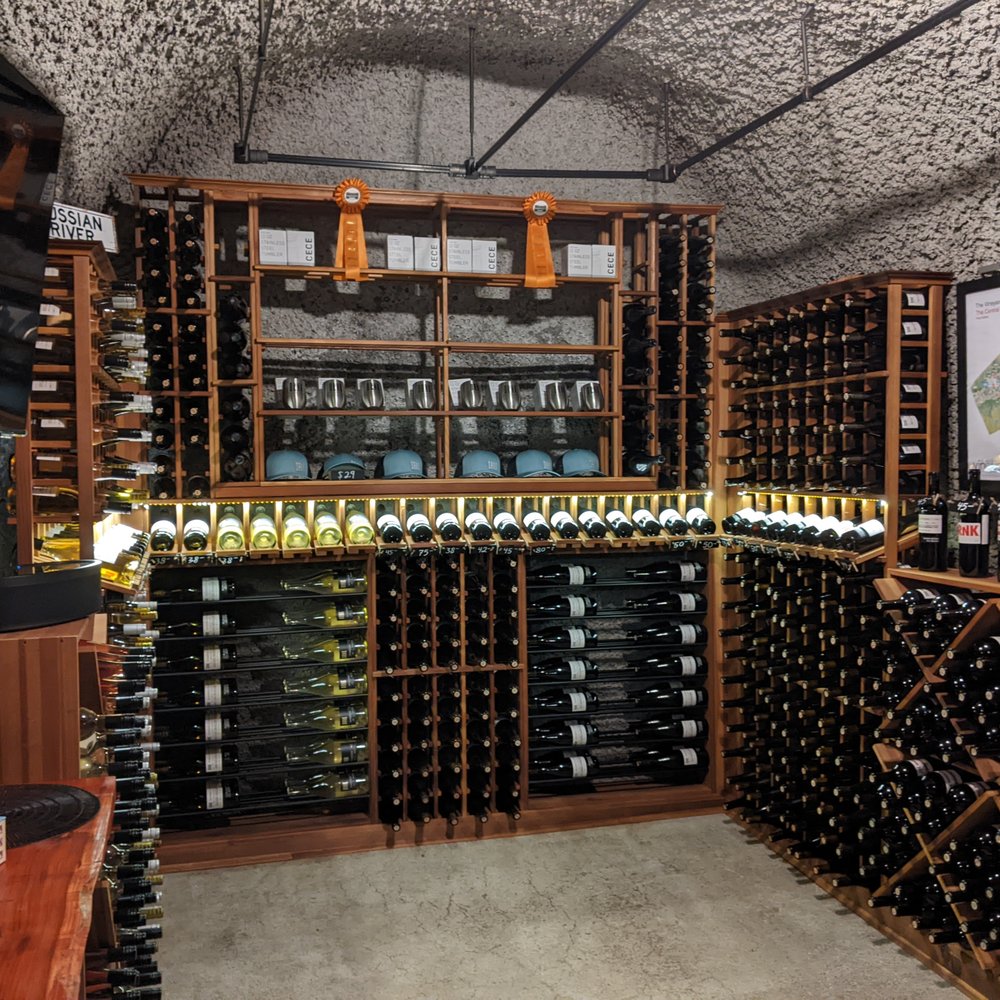 DRNK Wines - a wine cellar full of bottles - Wineries Near Me - Sebastopol, California