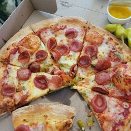Peperoni and jalapeno pizza, green peppers instead of jalapenos Peperoni and jalapeno pizza, green peppers instead of jalapenos