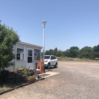 Jc cedarview - a white truck parked in front of a mobile home - Fuel Docks Near Me - Lewellen, Nebraska