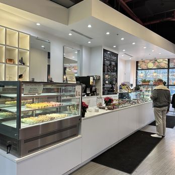 Praline Bakery - Interior with pastry counter. - Bakeries Near Me - Washington, DC, District of Columbia