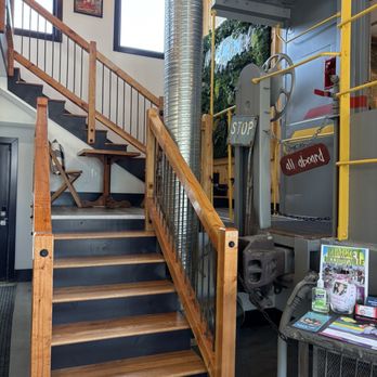 Coffee At The Crossing - Stairs to areas of seating inside. - Coffee & Tea Near Me - McCordsville, Indiana