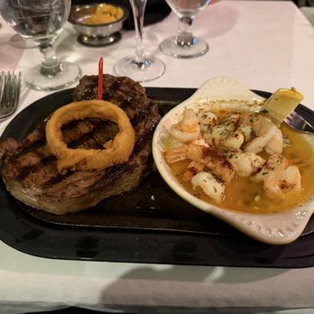 Beef 'N Bottle - Choice Cut Ribeye and Shrimp Scampi  Side: Thick creamy mash potatoes - Steakhouses Near Me - Charlotte, North Carolina
