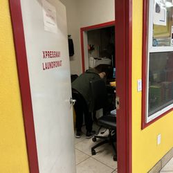 Xpressway Laundromat - This is him in the office. I can't take a photo when he is this aggressive.