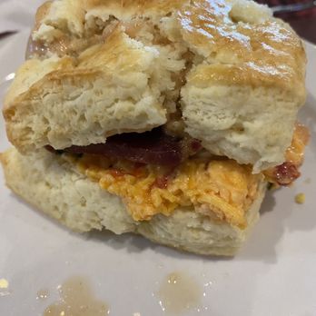 Sunrise Memphis - The Dirty South with country ham...started to take a bite before taking a picture, that's why the biscuit is cracked. - Breakfast & Brunch Near Me - Memphis, Tennessee Sunrise Memphis - The Dirty South with country ham...started to take a bite before taking a picture, that's why the biscuit is cracked. - Breakfast & Brunch Near Me - Memphis, Tennessee