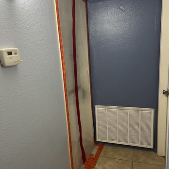 Breathe Easy - Negative pressure containment of contaminated area. - Damage Restoration Near Me