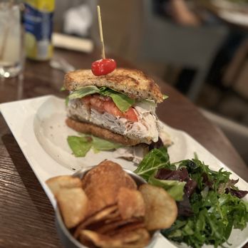 Vaudeville - Vaudeville Signature Club Sandwich. Generous portions too. Homemade chips. - New American Near Me - Fredericksburg, Texas Vaudeville - Vaudeville Signature Club Sandwich. Generous portions too. Homemade chips. - New American Near Me - Fredericksburg, Texas