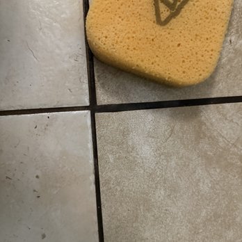 Around the House Handy Services - The tile he installed that completely uneven and does not match the floor - Window Washing Near Me
