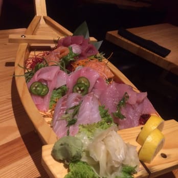 Moshi Moshi - This is the sashimi for two and it was perfect!! We each ordered a roll and the boat & we're both STUFFED at the end!! - Sushi Bars Near Me - Miami Beach, Florida