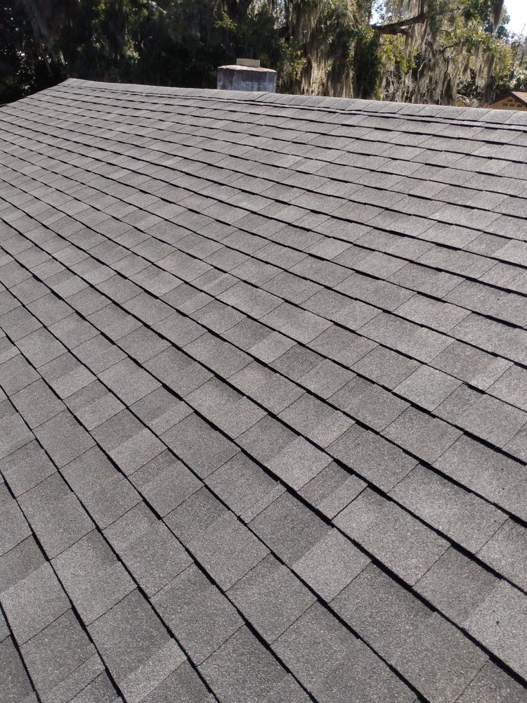 Slide of UnZucky Roofing