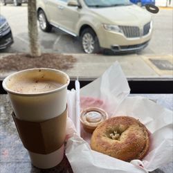 Brown Dog Coffee Company - Honey wheat bagel with peanut butter, dirty chai with oat milk with a shot of pumpkin spice and a sprinkle of Cheryl cinnamon.