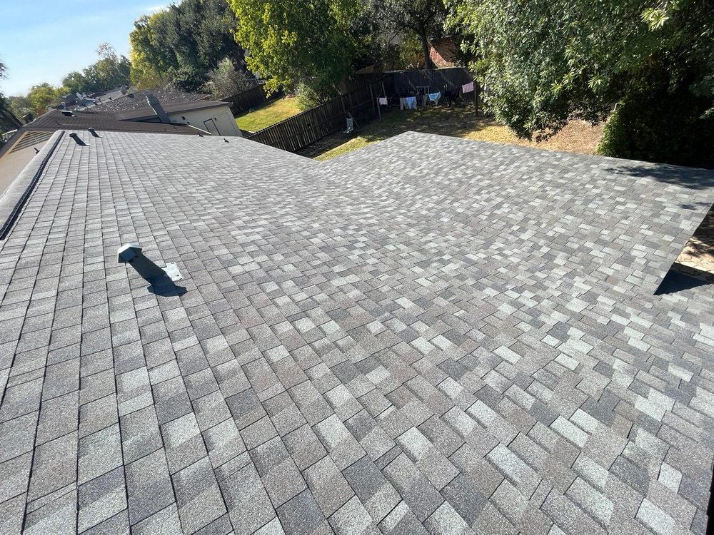 Slide of JUST ROOFING AND REMODELING