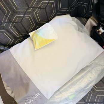 EVA Air - Headphones, pillow and blanket - Airlines Near Me - San Francisco, California EVA Air - Headphones, pillow and blanket - Airlines Near Me - San Francisco, California