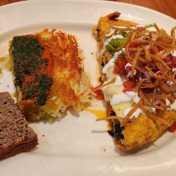 Blue's Egg + Bakery - This is the Frittata Ranchero already split in half to share, with gluten-free bread and chicken chorizo browns. Great choice. - Breakfast & Brunch Near Me - Milwaukee, Wisconsin