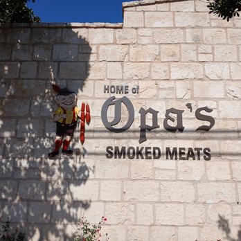 Opa's Smoked Meats - Exterior signage. The gent who helped us even looked like Opa! - Meat Shops Near Me - Fredericksburg, Texas