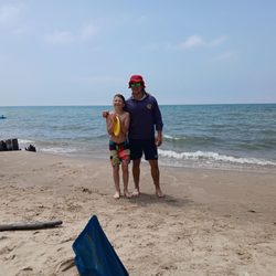 Covert Park Beach and Campground - Austin helping the boys at the beach.