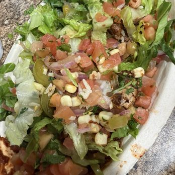 Chipotle Mexican Grill - White rice, chicken and steak (barely anything), grilled veggies, pico de gallo, red salsa, corn, and lettuce. - Mexican Near Me - Seal Beach, California Chipotle Mexican Grill - White rice, chicken and steak (barely anything), grilled veggies, pico de gallo, red salsa, corn, and lettuce. - Mexican Near Me - Seal Beach, California